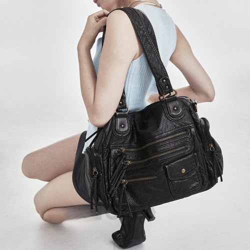 Bolso de hombro, tendencia retro Y2K, de gran capacidad y acabado lavado con efecto desgastado.