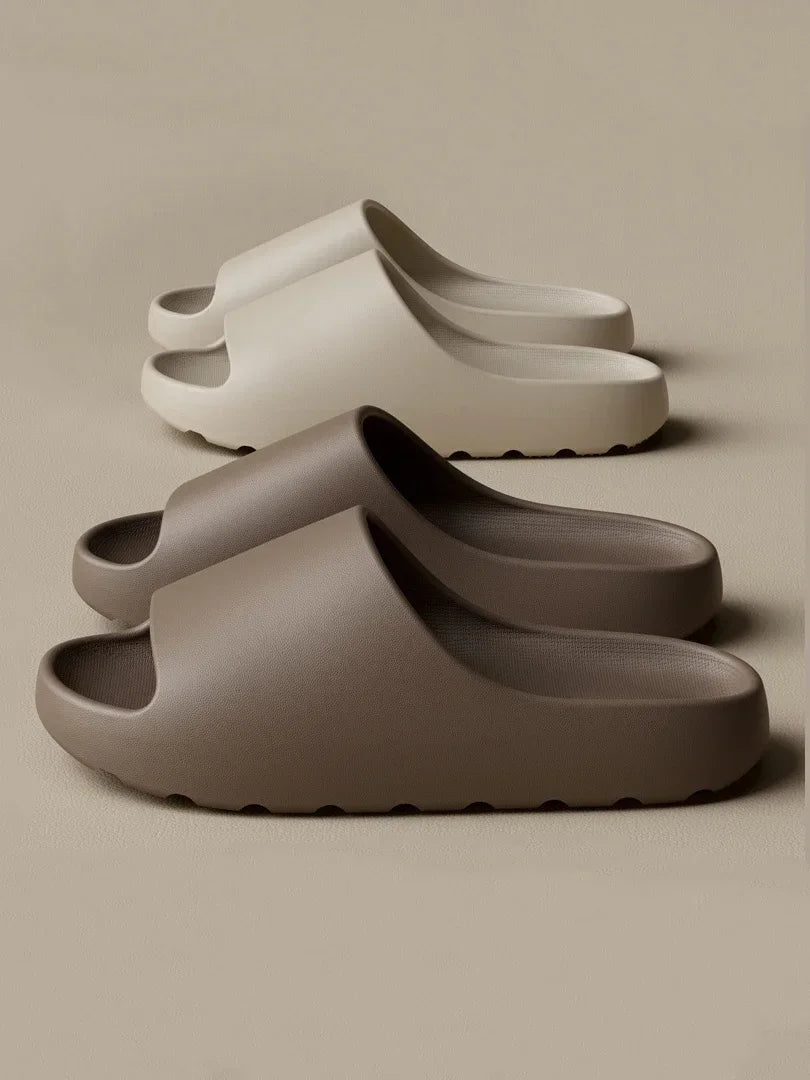 Zapatillas de casa para hombre y mujer de EVA, ligeras y con suela blanda; calzado casual tipo chancla de alta calidad, disponible en stock.