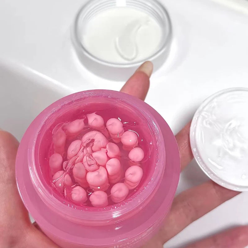 Crema coreana en cápsulas de colágeno rosa y PDRN con niacinamida para tono de piel desigual; hidratante facial ligero y no graso.