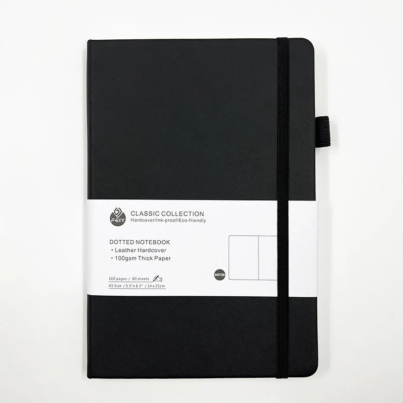 Cuaderno A5 con estampado de puntos y cierre de banda elástica; ideal para oficina, negocios o uso estudiantil; diseño elegante y atractivo.