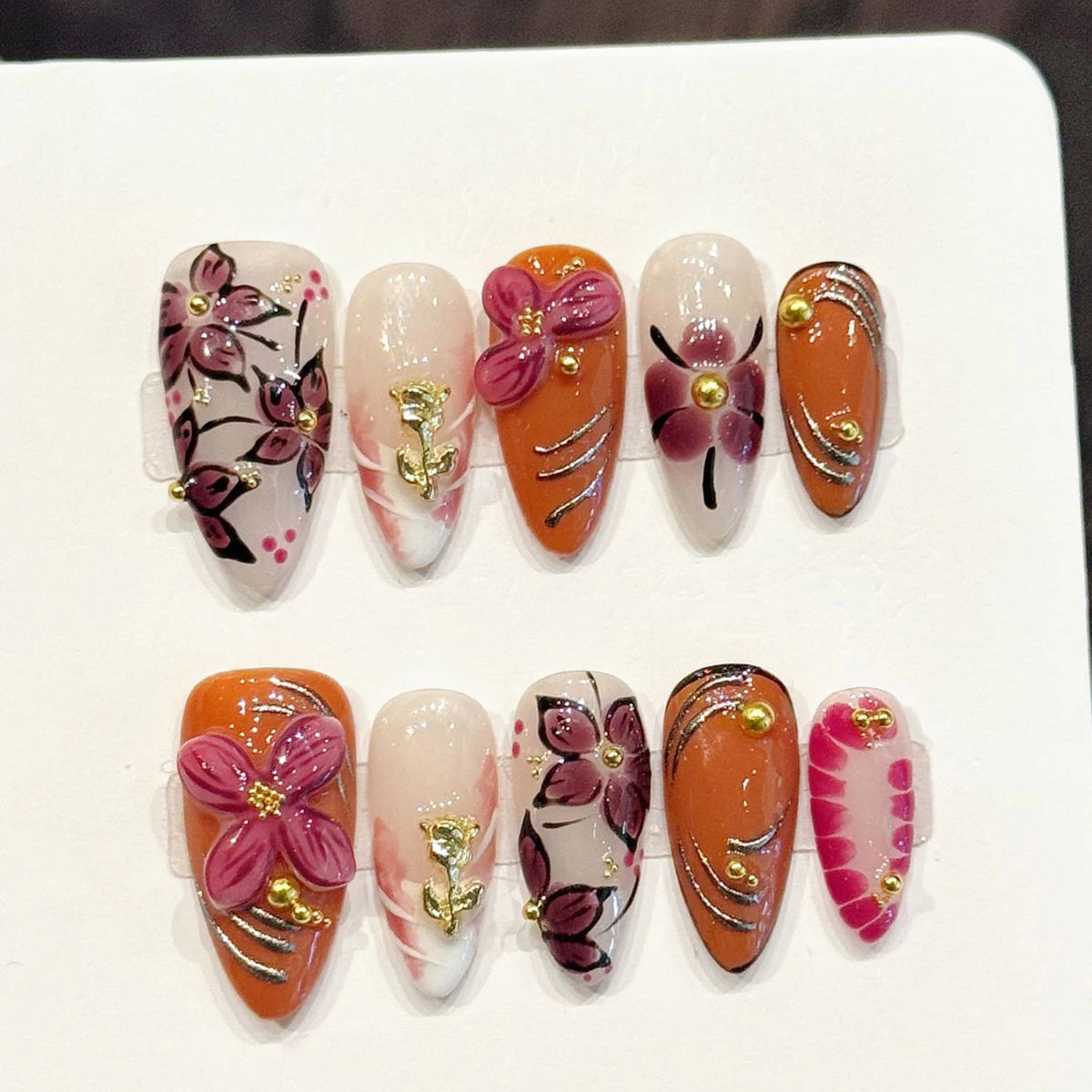 10 uñas postizas hechas a mano con decoración de pétalos tallados en 3D, estilo almendra, de fácil aplicación a presión; herramienta de manicura para mujer, uñas postizas reutilizables.