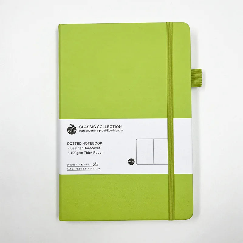 Cuaderno A5 con estampado de puntos y cierre de banda elástica; ideal para oficina, negocios o uso estudiantil; diseño elegante y atractivo.