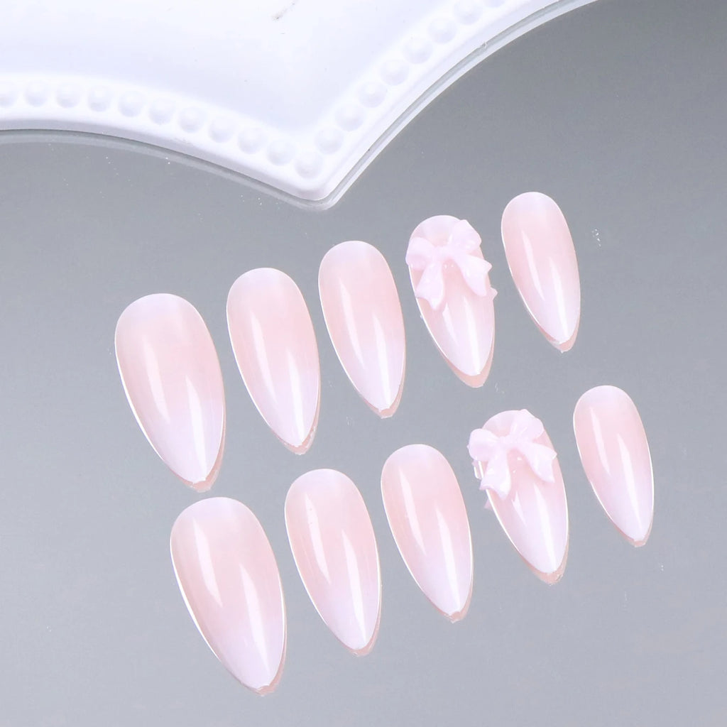 24 piezas de uñas postizas almendradas de tamaño mediano con diseños de lazo rosa, uñas acrílicas brillantes para pegar, ideales para mujeres y niñas.