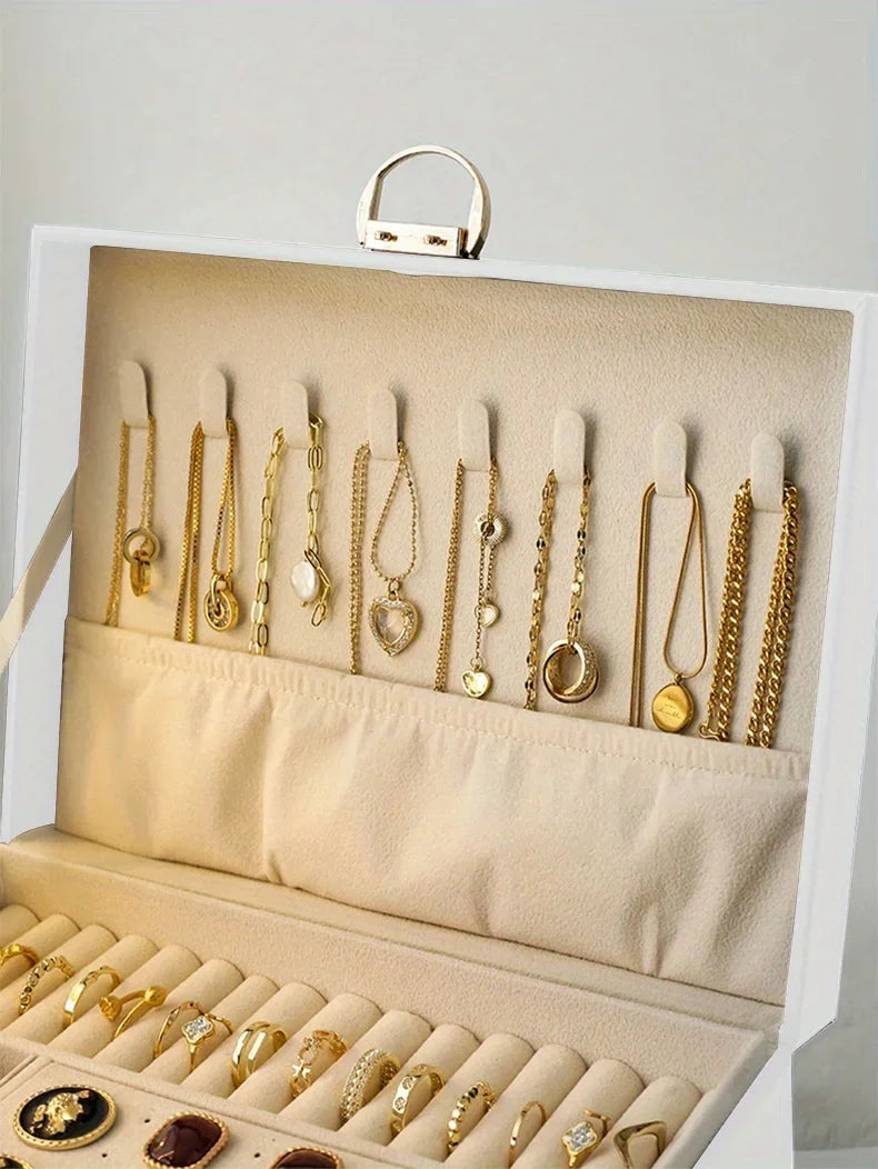 1 caja para guardar joyas (collares y pendientes); opción ideal para regalo.