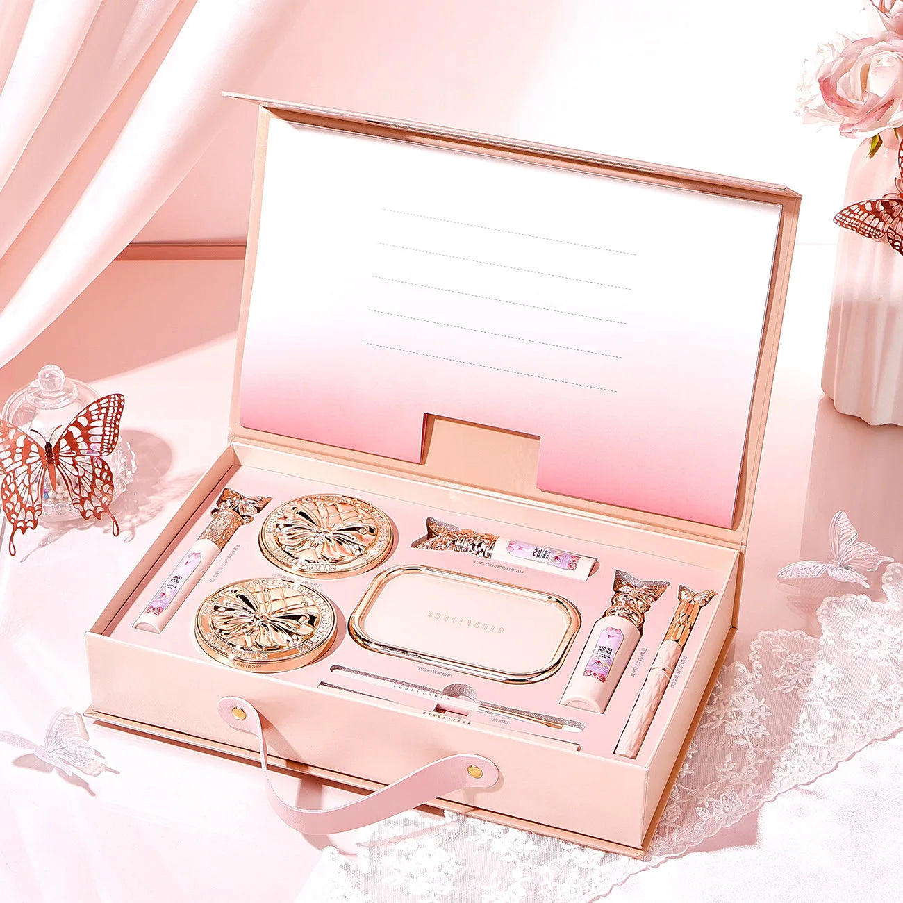 Set de maquillaje completo: labial, sombra de ojos, lápiz de cejas, BB cream tipo *cushion* y máscara de pestañas (9 piezas en caja de regalo).