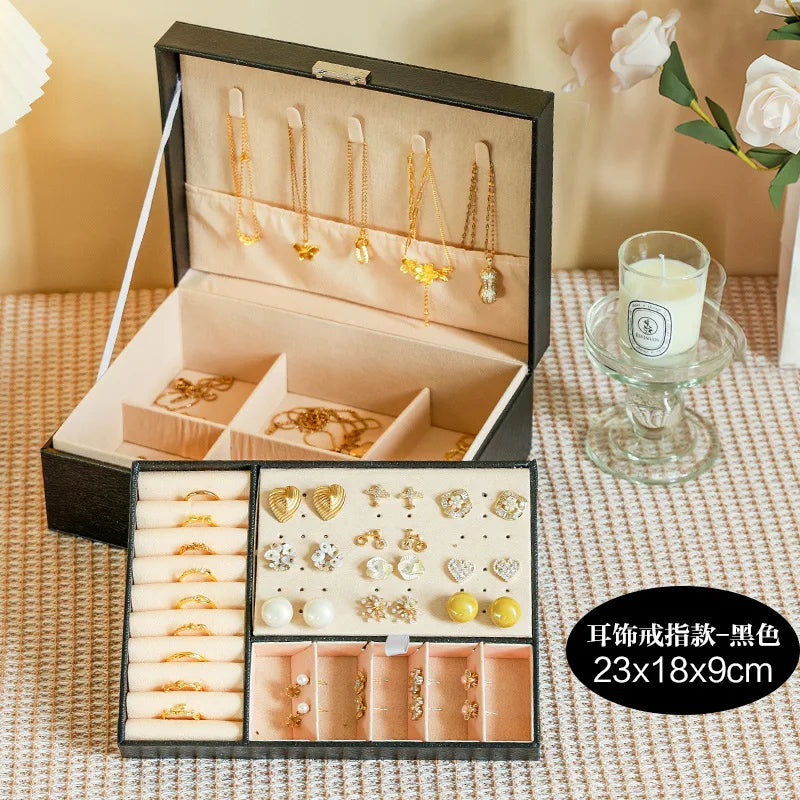 1 caja para guardar joyas (collares y pendientes); opción ideal para regalo.