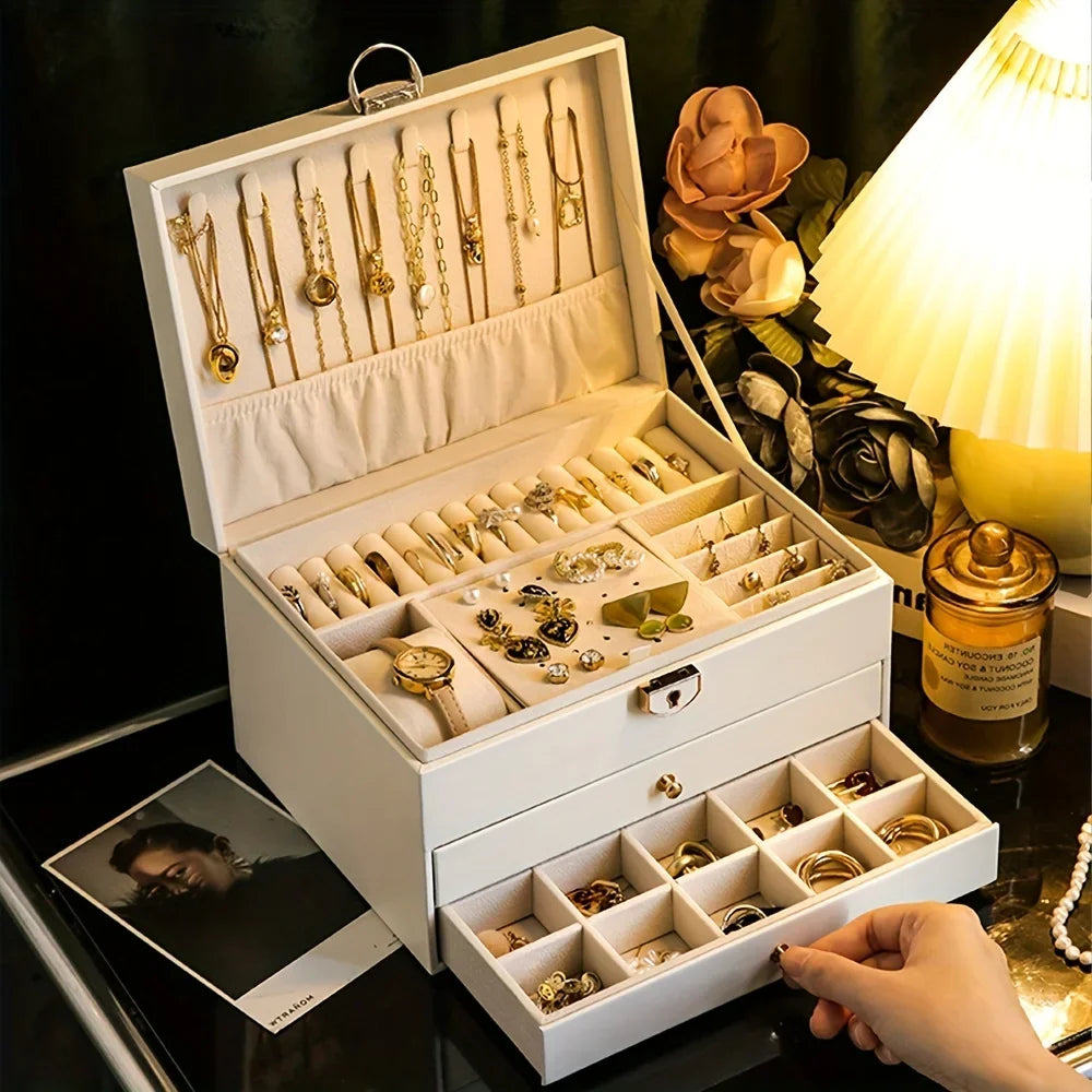 1 caja para guardar joyas (collares y pendientes); opción ideal para regalo.