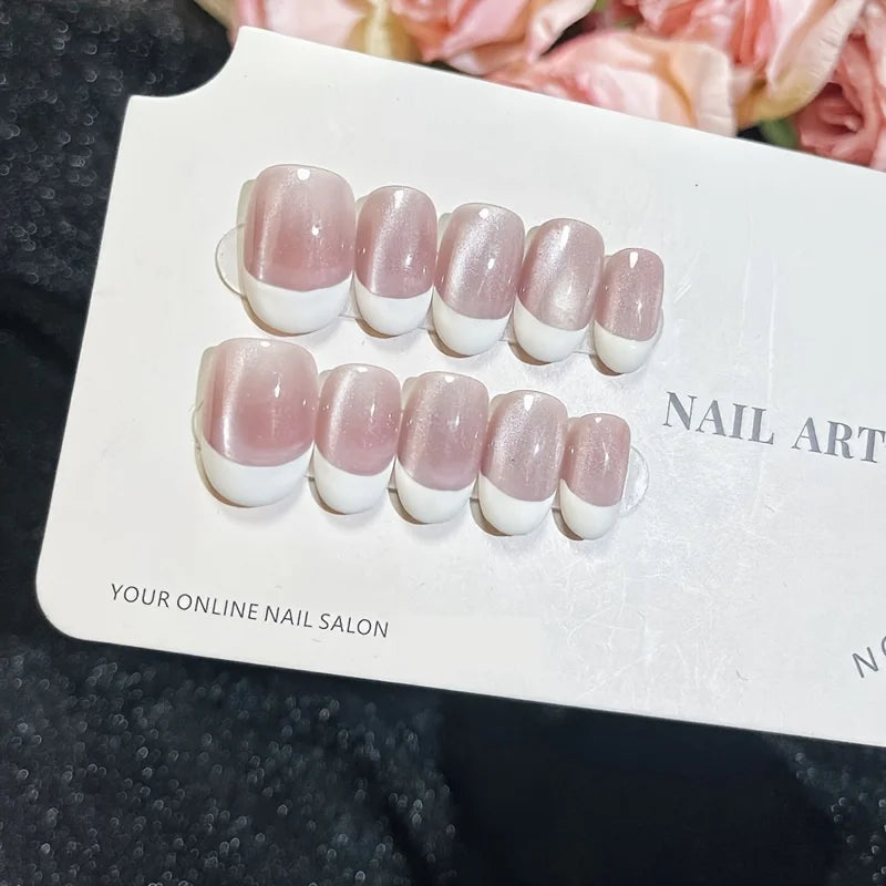 10 piezas de uñas postizas hechas a mano (estilo *press-on*) de longitud media; diseño francés con borde rosa escalonado y efecto ojo de gato brillante; cobertura total para mujeres y chicas.