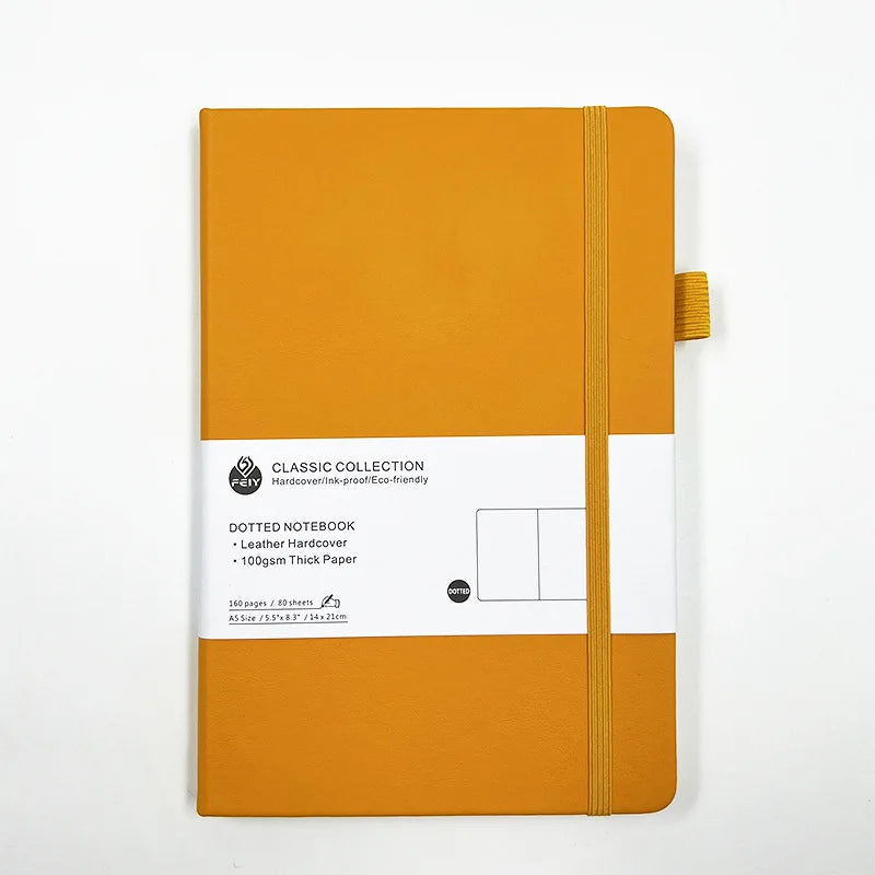 Cuaderno A5 con estampado de puntos y cierre de banda elástica; ideal para oficina, negocios o uso estudiantil; diseño elegante y atractivo.
