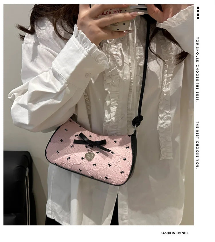 Bolso de hombro pequeño y cuadrado estilo Y2K , con diseño de lazo rosa, un accesorio versátil y moderno.